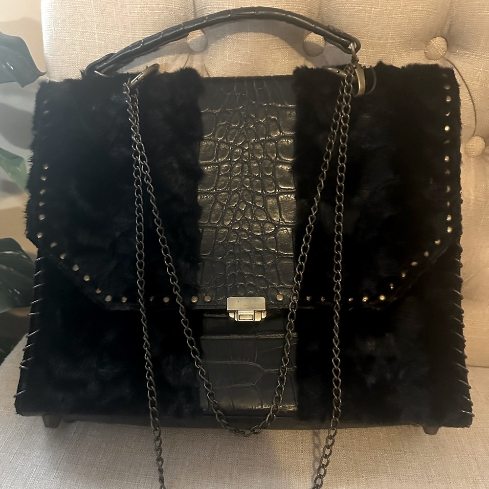 Authentic genuine leather and limited addition croc and mink handbag.